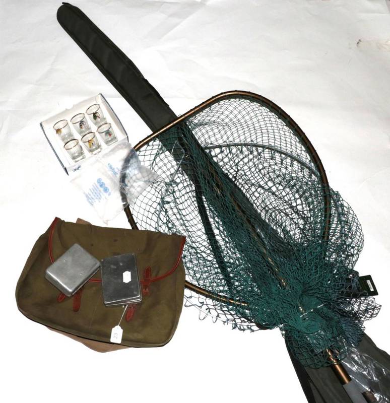 Lot 23 - A collection of fishing tackle and accessories, including two alloy-framed fixed head landing nets