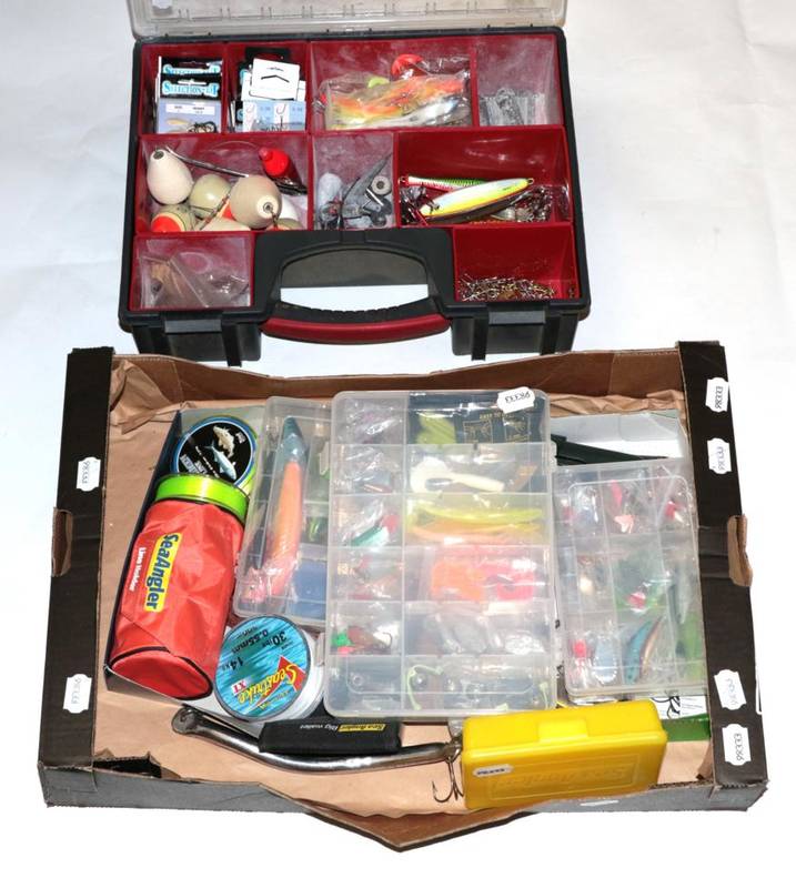 Lot 54 - An accumulation of fishing tackle and accessories, including: fifteen modern spinning /...