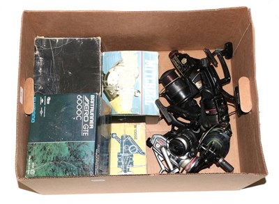 Lot 73 - Five spinning / multiplier / beachcaster reels in original boxes, comprising: Mitchell Garcia...