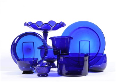 Lot 6 - A Collection of Blue Glasswares, 19th and 20th century, comprising a pedestal dish with frilled...