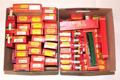 Lot 161 - Triang/Hornby OO Gauge A Collection Of Assorted Rolling Stock including 22 coaches and various...