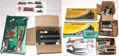 Lot 166 - Trix Cadet Goods Set with 0-4-0T BR locomotive (boxed) a further similar locomotive and loose...