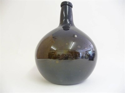 Lot 13 - An Apothecary's Glass Carboy, late 18th/early 19th century, of onion form with string ring and kick