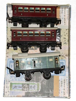 Lot 301 - Kraus O Gauge Three 4-Wheel Coaches two 1st/2nd brown and Leipzig 1123 Baggage car (all G) (3)