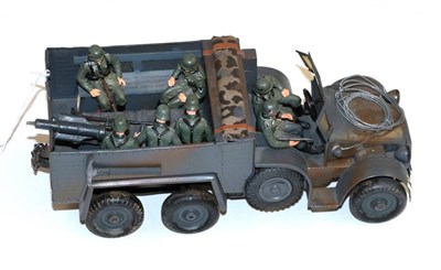 Lot 325 - Hausser 6-Wheel Transport Lorry with seven composition soldier figures (generally G, but has...