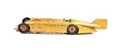 Lot 329 - Kingsbury Golden Arrow with cast figure and clockwork motor 19 3/4'', 50cm (G-F, signs of...
