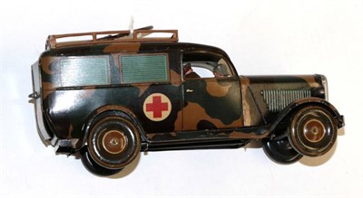 Lot 330 - Made In Germany Military Ambulance in camouflage livery with red cross to roof and sides, two...