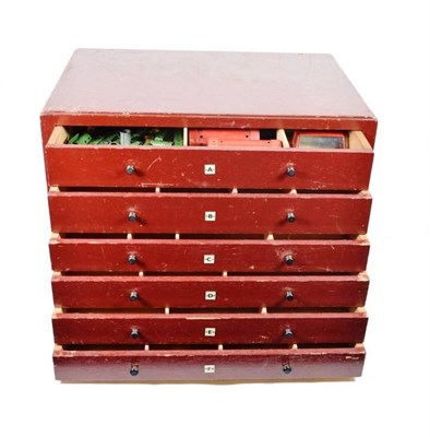 Lot 338 - Meccano Dealers Cabinet (1950's) burgundy finish, with 6 drawers lettered A to F  21 1/2x 15 3/4x14