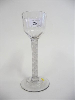 Lot 26 - A Wine Glass, circa 1765, the ogee bowl with eight panel moulding, on a double series opaque...