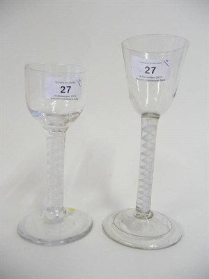 Lot 27 - A Wine Glass, circa 1760, the round funnel bowl on a single series opaque twist stem comprising...