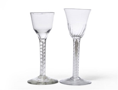 Lot 30 - A Wine Glass, circa 1765, the rounded funnel bowl with basal fluting, on a double series opaque...