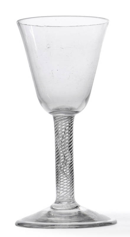 Lot 31 - A Wine Goblet, circa 1750, the round funnel bowl on a multiple spiral air twist stem, 20.4cm high