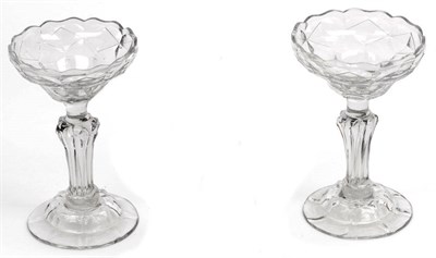 Lot 36 - A Pair of Glass Sweetmeat Dishes, mid 18th century, the diamond cut ogee bowls on panelled pedestal