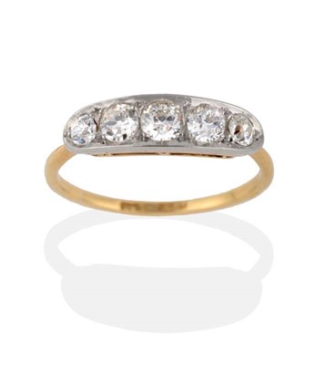Lot 2004 - A Diamond Five Stone Ring, the graduated old cut diamonds in a white boat shaped setting, to a...