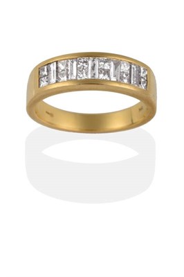Lot 2006 - An 18 Carat Gold Diamond Half Hoop Ring, pairs of princess cut diamonds alternate with baguette cut