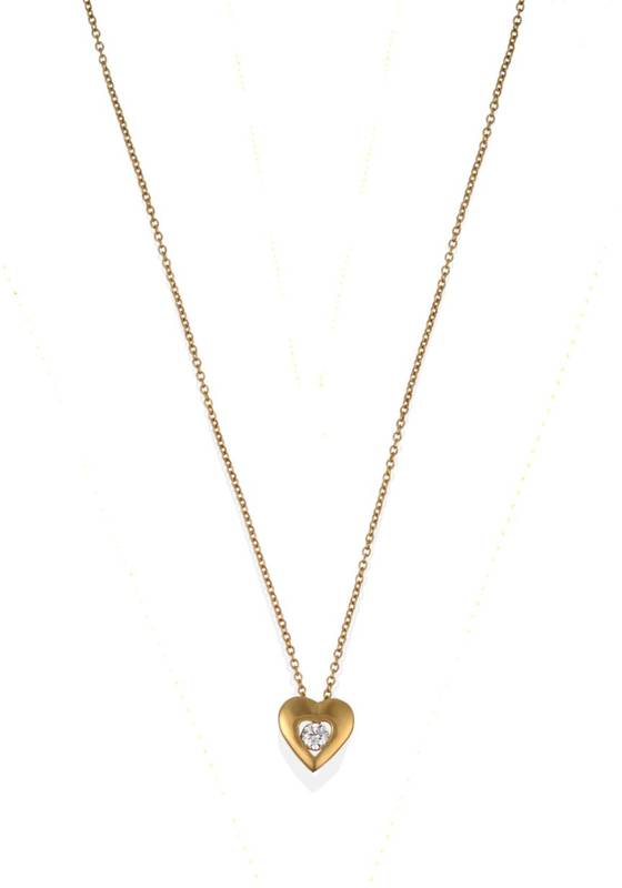 Lot 2013 - An 18 Carat Gold Heart Pendant on Chain, the yellow polished heart pendant with a heart shaped...