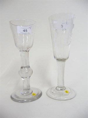 Lot 45 - An Ale Glass, circa 1750, the bowl engraved with fruiting hops, plain stem, on a broadly folded...