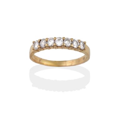 Lot 2021 - A Diamond Half Hoop Ring, the round brilliant cut diamonds in yellow claws to a plain polished...