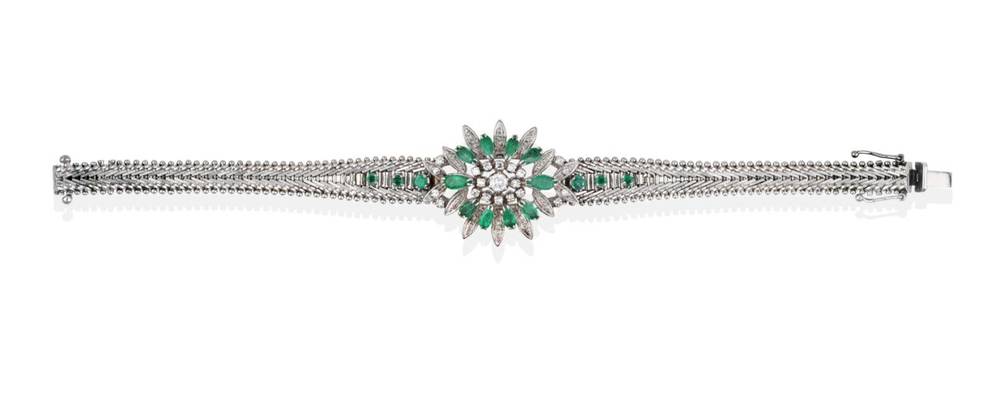 Lot 2029 - An Emerald and Diamond Bracelet, a lozenge shaped panel comprised of round brilliant cut and...