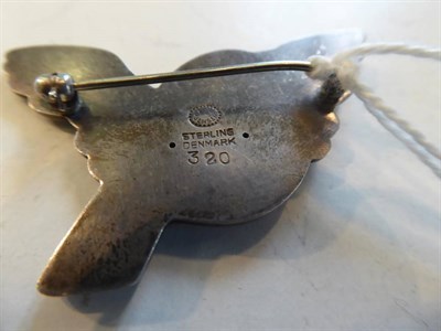 Lot 2058 - A Silver Bird Brooch, by Georg Jensen, model 320, measures 4.2cm by 2.9cm