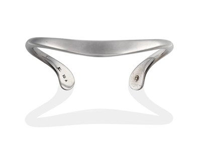 Lot 2062 - A Torque Bangle, by Georg Jensen, of plain polished form, numbered 10A, measures 6.2cm by 5cm...