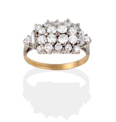 Lot 2070 - An 18 Carat Gold Diamond Cluster Ring, round brilliant cut diamonds in an oblong form, a...