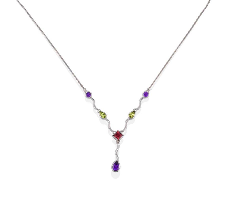 Lot 2079 - An 18 Carat White Gold Multi Gemstone Necklace, the white curb link chain to a centre section...
