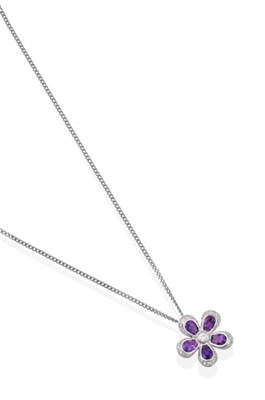 Lot 2086 - An 18 Carat White Gold Amethyst and Diamond Pendant on Chain, the cluster of floral form, a...