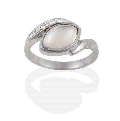 Lot 2094 - An 18 Carat White Gold Moonstone and Diamond Ring, the marquise shaped cabochon moonstone...