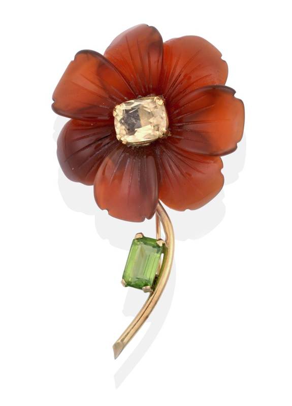Lot 2107 - A Carnelian, Citrine and Peridot Flower Brooch, a cushion cut citrine in a claw setting, within...