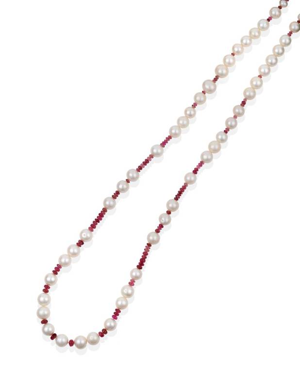 Lot 2116 - A Pink Tourmaline and Cultured Pearl Necklace, pink tourmaline beads spaced at intervals by...