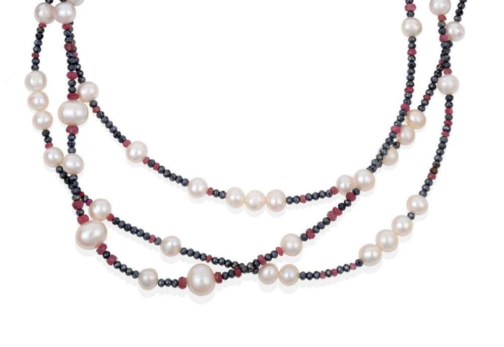Lot 2126 - A Multi-Gemstone and Cultured Pearl Necklace, faceted ruby beads spaced at intervals by...