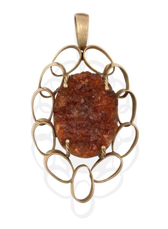 Lot 2132 - A 9 Carat Gold Citrine Pendant, the rough citrine crystals in four ropework claws, to an...