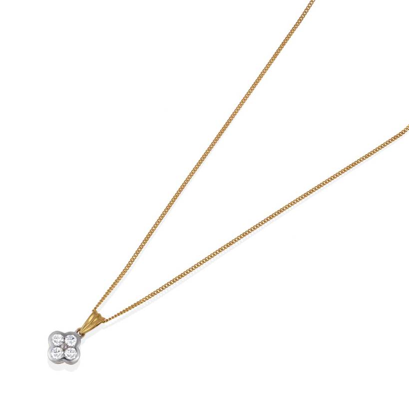 Lot 2137 - An 18 Carat Gold Diamond Pendant on Chain, a yellow grooved pendant bale suspends a quatrefoil...