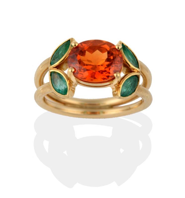 Lot 2140 - An 18 Carat Gold Spessartine Garnet and Emerald Ring, the oval cut orange garnet in yellow...