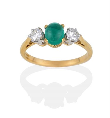 Lot 2159 - An 18 Carat Gold Emerald and Diamond Three Stone Ring, the oval cabochon emerald in four yellow...