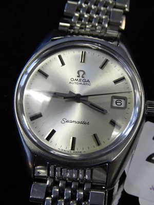 Lot 2163 - A Stainless Steel Automatic Calendar Centre Seconds Wristwatch, signed Omega, model: Seamaster,...