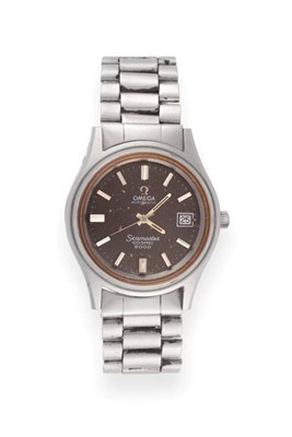 Lot 2169 - A Stainless Steel Automatic Calendar Centre seconds Wristwatch, signed Omega, model: Seamaster...