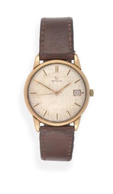 Lot 2178 - A 9ct Gold Calendar Centre Seconds Wristwatch, signed Omega, 1964, (calibre 610) lever movement...