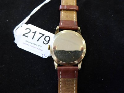 Lot 2179 - A 9ct Gold Wristwatch, signed Omega, Geneve, 1957, (calibre 267) lever movement signed and numbered