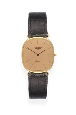 Lot 2188 - An 18ct Gold Wristwatch, signed Longines, circa 1985, quartz movement, champagne coloured dial with