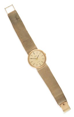 Lot 2193 - A 9ct Gold Wristwatch, signed Omega, model: De Ville, circa 1972, lever movement, champagne...