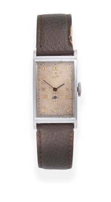 Lot 2238 - A Stainless Steel Curved Wristwatch, signed Lip, circa 1950, (calibre T18) lever movement...