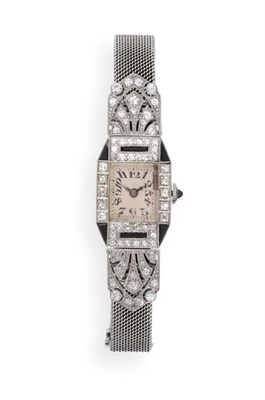 Lot 2292 - An Art Deco Lady's Diamond and Black Onyx Set Wristwatch, lever movement with four adjustments,...