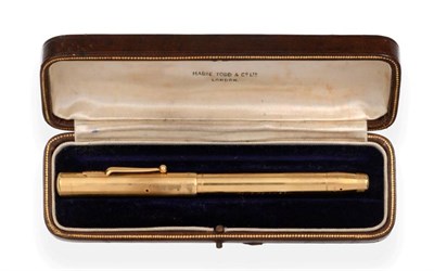 Lot 2306 - An 18ct Gold Swan Fountain Pen, Mabie, Todd & Co, London 1938, the nib marked ''Swan 2 14ct'',...