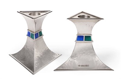 Lot 2316 - A Pair of Silver and Enamel Candlesticks, maker's mark ASL, Birmingham 2010, of triangular form...