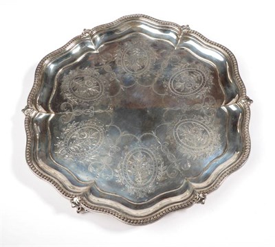 Lot 2324 - A Victorian Silver Salver, Thomas Smily, London 1870, shaped circular with bead border,...