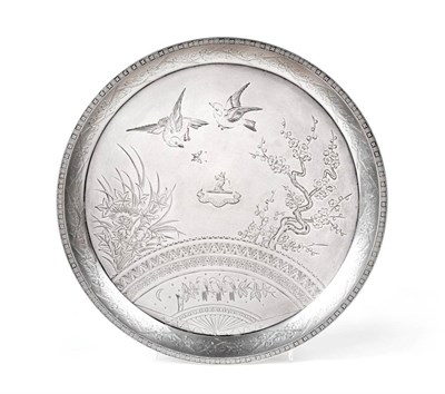 Lot 2330 - A Victorian Aesthetic Movement Silver Salver, Frederick Elkington, Birmingham 1880, circular on bun