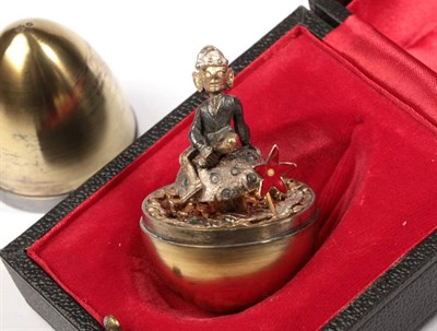 Lot 2336 - Stuart Devlin: A Silver Gilt Surprise Egg, London 1975, 'Pixie', the interior featuring a pixie sat