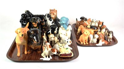 Lot 150 - Beswick Dogs including Dalmatians, Poodles, Golden Labrador, Dachshunds, Spaniels etc (qty on 2...